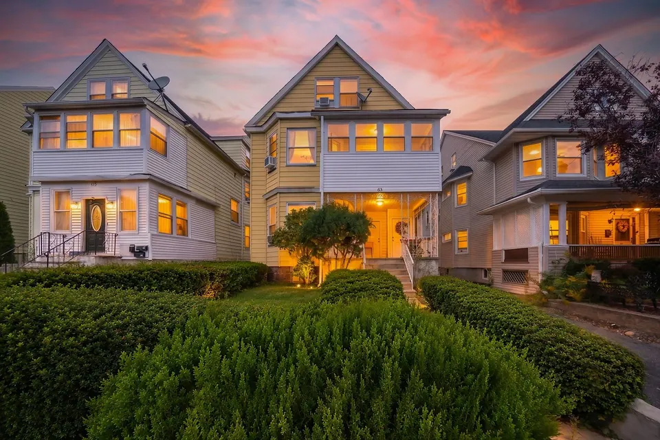 Exterior of the two-unit multifamily property at 63 Montague Place in Montclair, New Jersey